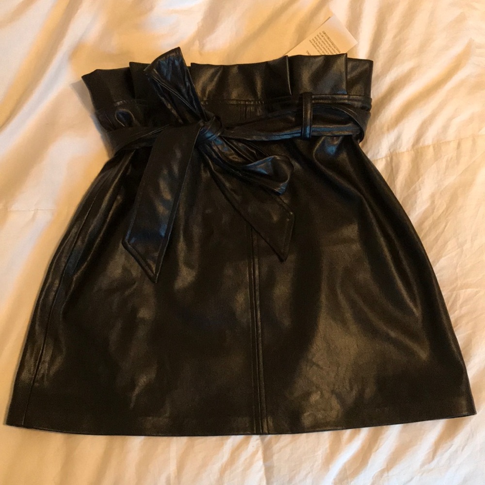 Never worn super cute faux leather skirt!